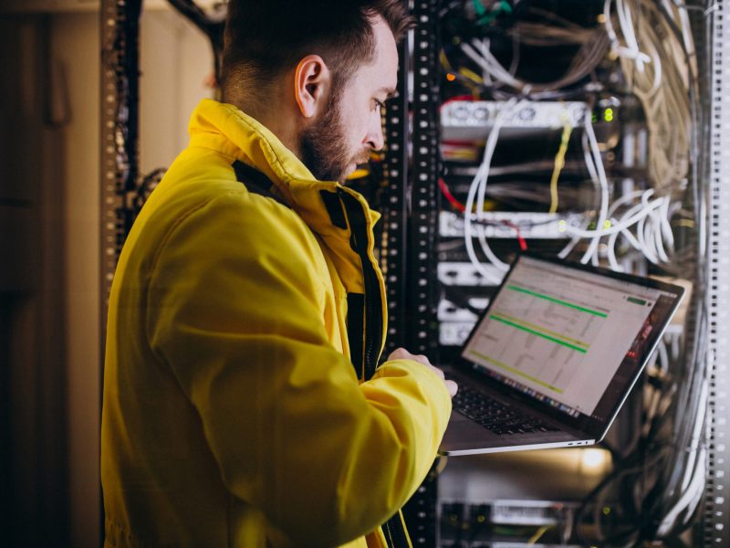 Young man engineer making program analyses